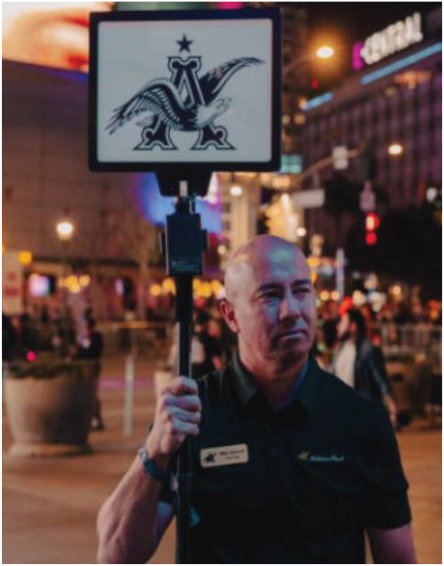 man holding a sign