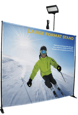 Large retractable banner stand showcasing a skier in action